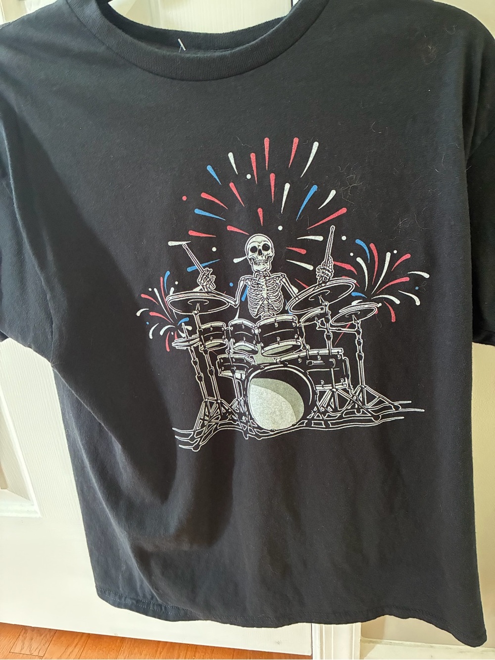 Black Skeleton Drummer Graphic Tee with Red & Blue Accents Medium